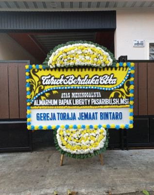 Papan Bunga Duka di Batukliang